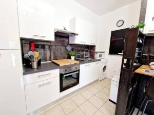 Appartements Cosy Dream - 4 pers - Parking Privatif - Centre : photos des chambres