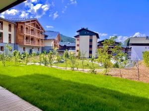 Luxueux Appartement au Centre des Gets avec Jardin, Proche Pistes, 3 Chambres, Wi-Fi, Parking - FR-1-623-338