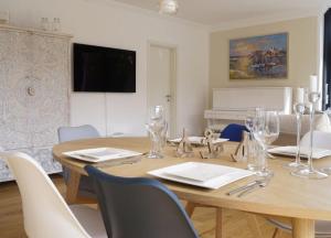 Wellenklang - Luxusbungalow mit Rosengarten