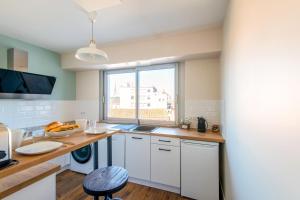 Appartements L'Amazone - Appartement d'exception avec parking : photos des chambres