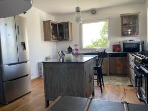 Maison individuelle avec grand jardin