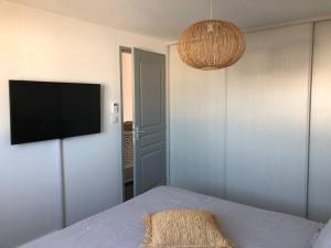 Appartements Votre appartement climatise a deux pas de la mer ! : photos des chambres