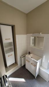 Appartements Logements A 2 PETITS PAS : photos des chambres