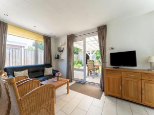 Holiday home in Baarland with garden