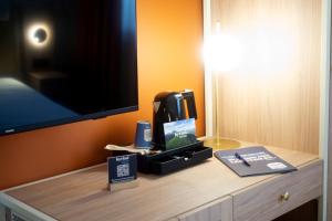 Hotels Kyriad Prestige Hotel Clermont-Ferrand : photos des chambres