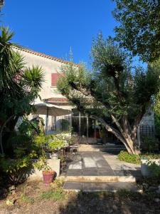 Maisons de vacances Maison 3 chambres avec piscine dans un jardin luxuriant : photos des chambres