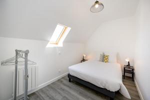 Maisons de vacances La Flora - Charmante maison avec jardin : photos des chambres