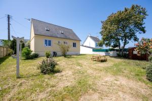 Maisons de vacances La Flora - Charmante maison avec jardin : photos des chambres