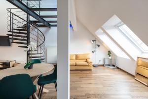 Appartements Le Loft Du Gibet : photos des chambres