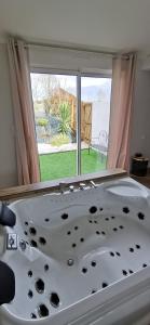 Maisons de vacances L'Essentiel - Love 5 Etoiles : photos des chambres