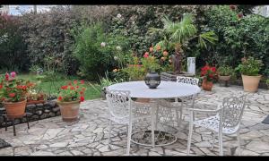 B&B / Chambres d'hotes d’un jardin a l’autre : photos des chambres