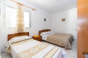 Two-Bedroom Holiday Home room in Seaside holiday house Kukljica Ugljan - 17930