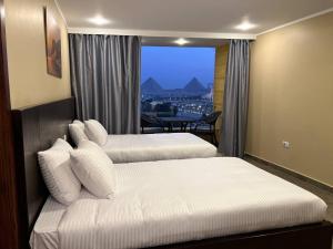 Asia Grand Museum & Pyramids view