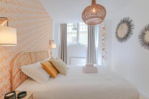 Appartements Charmant et cosy en hypercentre : photos des chambres