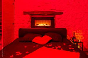 Appartements Love Room - Sauna - Secret Suite au calme : photos des chambres