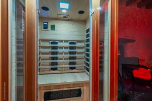 Appartements Love Room - Sauna - Secret Suite au calme : photos des chambres