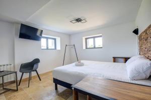 Maisons de vacances Combe Jolie, piscine, jacuzzi, wifi : photos des chambres