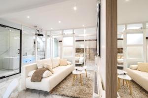 Appartements Evasion Chic - Spa prive & Cinema : photos des chambres