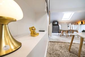 Appartements Evasion Chic - Spa prive & Cinema : photos des chambres