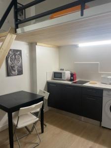 Appartements Le petit Louis Fort - Studio cosy-Gratte Ciel : photos des chambres