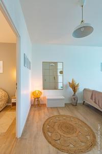 Appartements La Vie est belle : photos des chambres