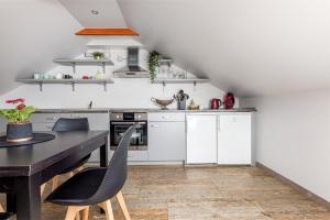 Apartamentas ant jūros kranto "Virš pušų"