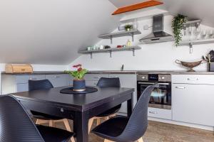 Apartamentas ant jūros kranto "Virš pušų"