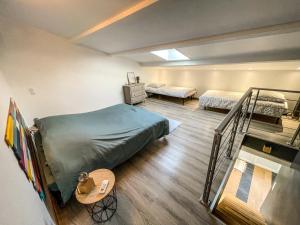 Appartements Le Petit Valexiane Piscine & Jardin : photos des chambres