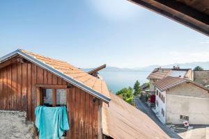 Maisons de vacances Chez Malou & Hugo vue lac proche Suisse & stations ! : photos des chambres