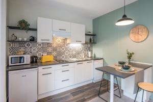 Appartements Cardabelle - Joli appt pour 2 avec parking prive : photos des chambres