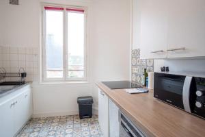 Appartements Le Boujou - Place de parking - 200m plage : photos des chambres