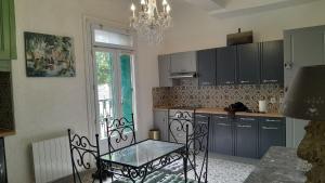 Appartements Appartement authentique au bord du fleuve Herault : photos des chambres