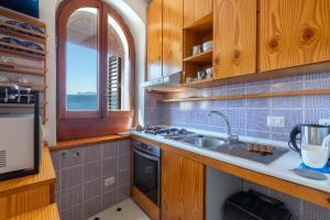 Alguerhome Casa Blu sea view img21