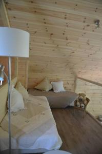 Chalets chalet bien-etre 100m² -Gite les 4 saisons - Lac de Chalain : photos des chambres