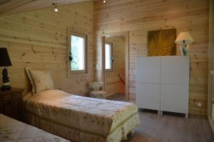 Chalets chalet bien-etre 100m² -Gite les 4 saisons - Lac de Chalain : photos des chambres