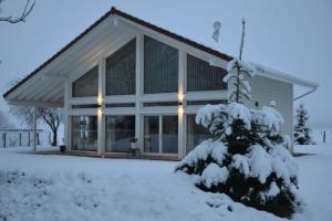 Chalets chalet bien-etre 100m² -Gite les 4 saisons - Lac de Chalain : photos des chambres