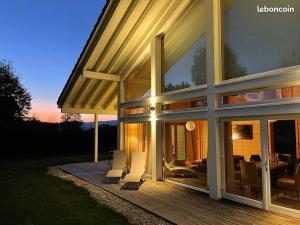 Chalets chalet bien-etre 100m² -Gite les 4 saisons - Lac de Chalain : photos des chambres