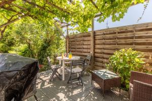 Appartements Rue Bien Assis avec jardin terrasse : photos des chambres