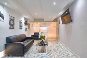 Malecon Rooms y Hotel