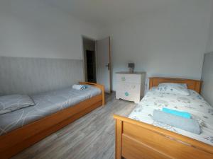 Appartements A 200 metres du lac d'Annecy, spacieux appartement 3 chambres avec terrasse et jardin : photos des chambres