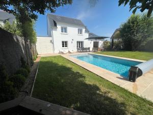 Villas Maison de famille avec piscine : photos des chambres