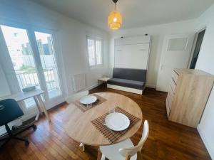 Appartements studio cosy face a la gare : photos des chambres