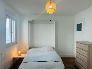 Appartements studio cosy face a la gare : photos des chambres