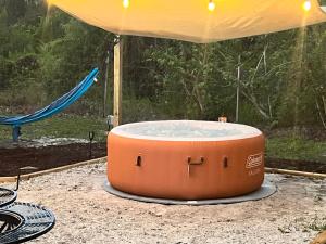 Tropical glamping with hot tub