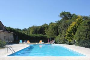 Maisons de vacances Ferme en pierre, site isole avec piscine : photos des chambres