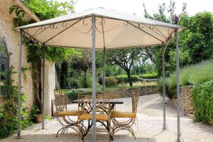 Maisons de vacances Ferme en pierre, site isole avec piscine : photos des chambres