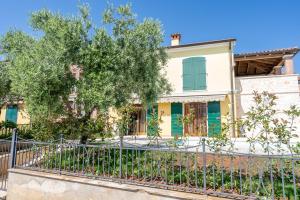 Charming Orange Apartment with Private Pool and Garden Oasis