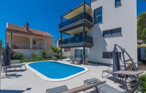 Modern apartments with shared pool near the sea