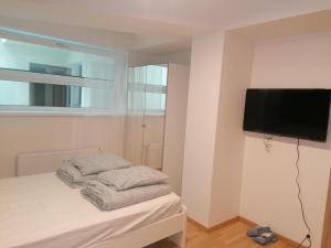 Studio brand new apartment #28 in new building with free parking in city center