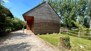 Chalets Chalet avec terrasse sur pilotis vue sur l'etang : photos des chambres